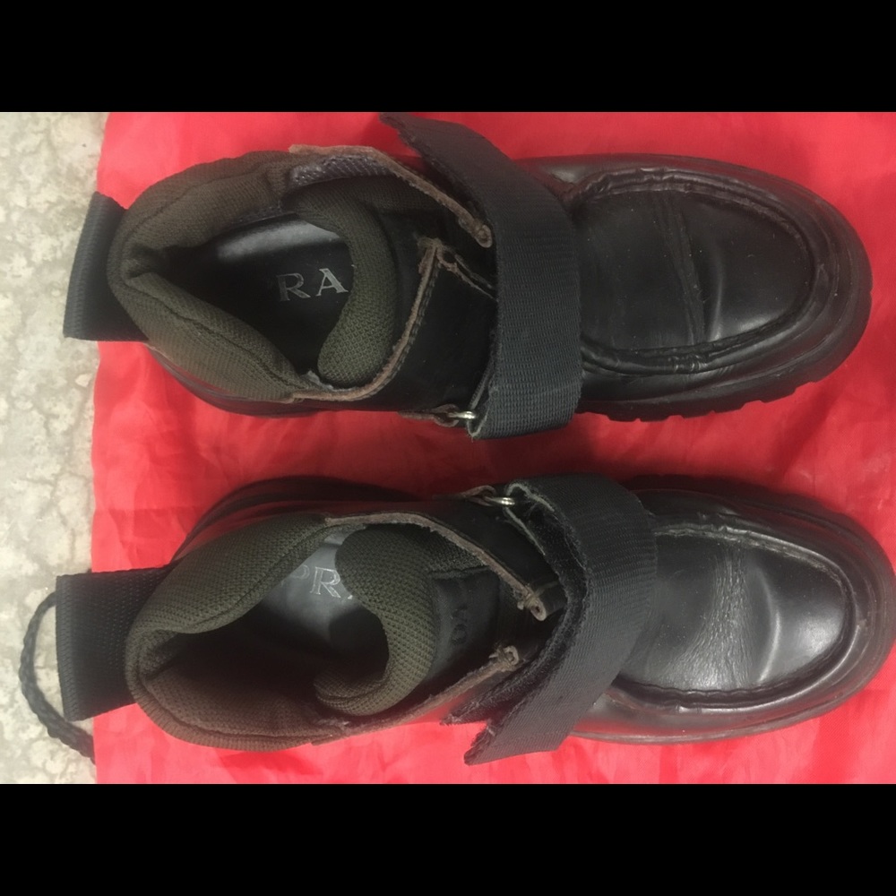 Chocolate and very durable Prada ankle boots.